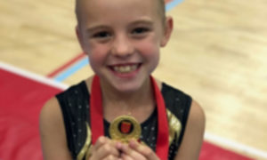 MINNIE MILLER Y5, RECORD BREAKING GYMNAST